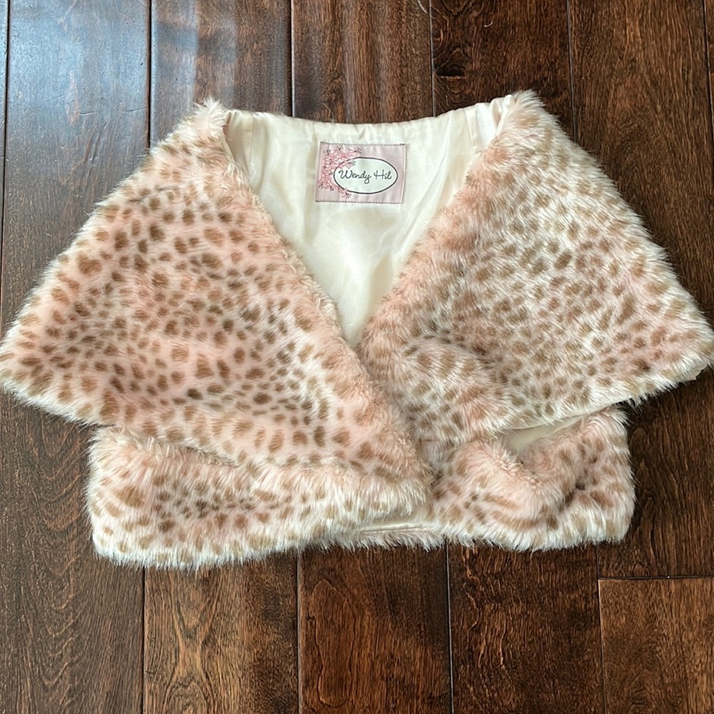 Pink and tan leopard faux fur shawl.